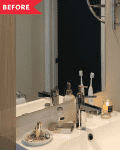 Bathroom with a white sink, toothbrushes, soap dispenser, candle, and wall-mounted towel ring.