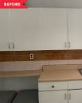 Before: simple kitchen with white cabinets and brick-colored tile