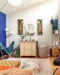 Bedroom with a mix of colors and textures, including a storage basket