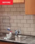 Subway tiles in kitchen before renovation.