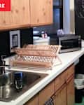 Colorful, multi-patterned kitchen before, during, and after renovation/redecoration.