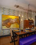 Cord pendants hanging above dining table.