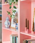 Decorative items on pink built-in.