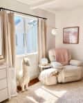 Recliner in corner of baby nursery.
