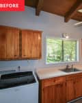 dark wood ceiling with beams, ceiling fan, wood cabinet kitchen with washing machine in kitchen before remodel