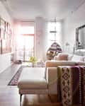 White sectional in sunny living room.