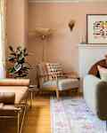 Floor lamp in corner of living room.