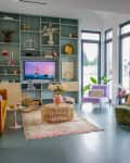 View of pastel living room from dining area.