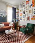 View of seating area in living room with gallery wall.