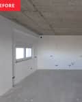 Dry wall up in empty kitchen during renovation.
