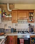 kitchen before renovation with wood cabinets