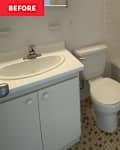 White bathroom with white and rust tiling