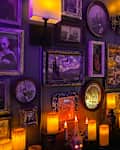 Halloween candles lit on alter in living room.