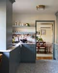Marble countertops in blue and white kitchen