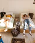 Young female tourists staying in youth hostel
