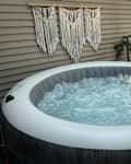 INTEX PureSpa Greywood Deluxe Inflatable Spa Set in someone's yard