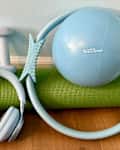 Your Reformer Prop Starter Kit with yoga mat on floor