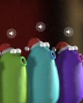 Colorful cartoon creatures wearing Santa hats, singing with snow falling.