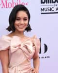 Woman in a pink dress with a large bow at the 2017 Billboard Music Awards.