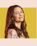 Headshot of Drew Barrymore on colored background