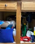 Disorganized under sink.