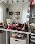 Beauty products on white shelves