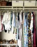 Closet with clothing, shoes, and basket storage. Quincy Bulin stopped organizing closet by color.