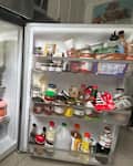 Refrigerator before being organized using Sorbus storage bins.
