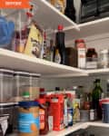 Before: white shelves with food staples like peanut butter, oils, and syrups