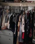 Disorganized closet before professional organizing.