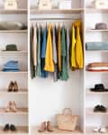 Big wardrobe with clothes in sterile dressing room