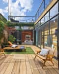 Furnished terrace with string lights overhead