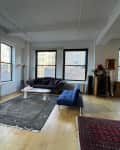 Living room of large loft apartment before staging redecoration.
