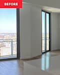 Spacious modern kitchen with a large white island, floor-to-ceiling windows, and a view of the city skyline.