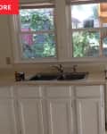 Kitchen countertop and cabinets before renovation.