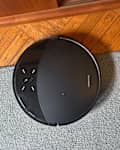 The  roborock Saros 10R Robot Vacuum and Mop in use in someone's home
