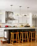 Kitchen with dog bowls at end of island