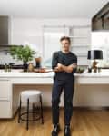 Jeremiah Brent in a kitchen with his Grove Collaborative collection