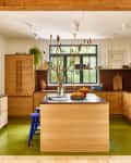 Montauk Kitchen with red stone countertops designed by Studio McKinley