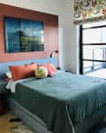 Gothic Cabinet Craft Captain's Bed in a blue finish in a room designed by interior designer Gunnar Larson