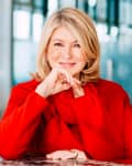 Lifestyle headshot of Martha Stewart dressed in red