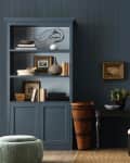 Dark blue painted home office.