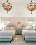 Twin beds in newly decorated bedroom.