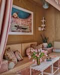 Using fabric bunting to upgrade walls.