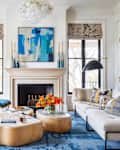 Blue and white color scheme in living room using 60:30:10 ratio.