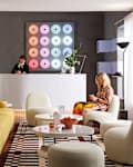 Full range of new colors of the IKEA VARMBLIXT LED table/wall lamp behind lobby desk
