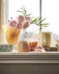 multicolored floral decor pieces on window sill