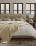 neutral bedroom with white and ivory bedding