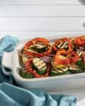 white stoneware baking dish holding grilled veggies