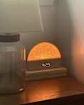 Hatch alarm clock on nightstand.